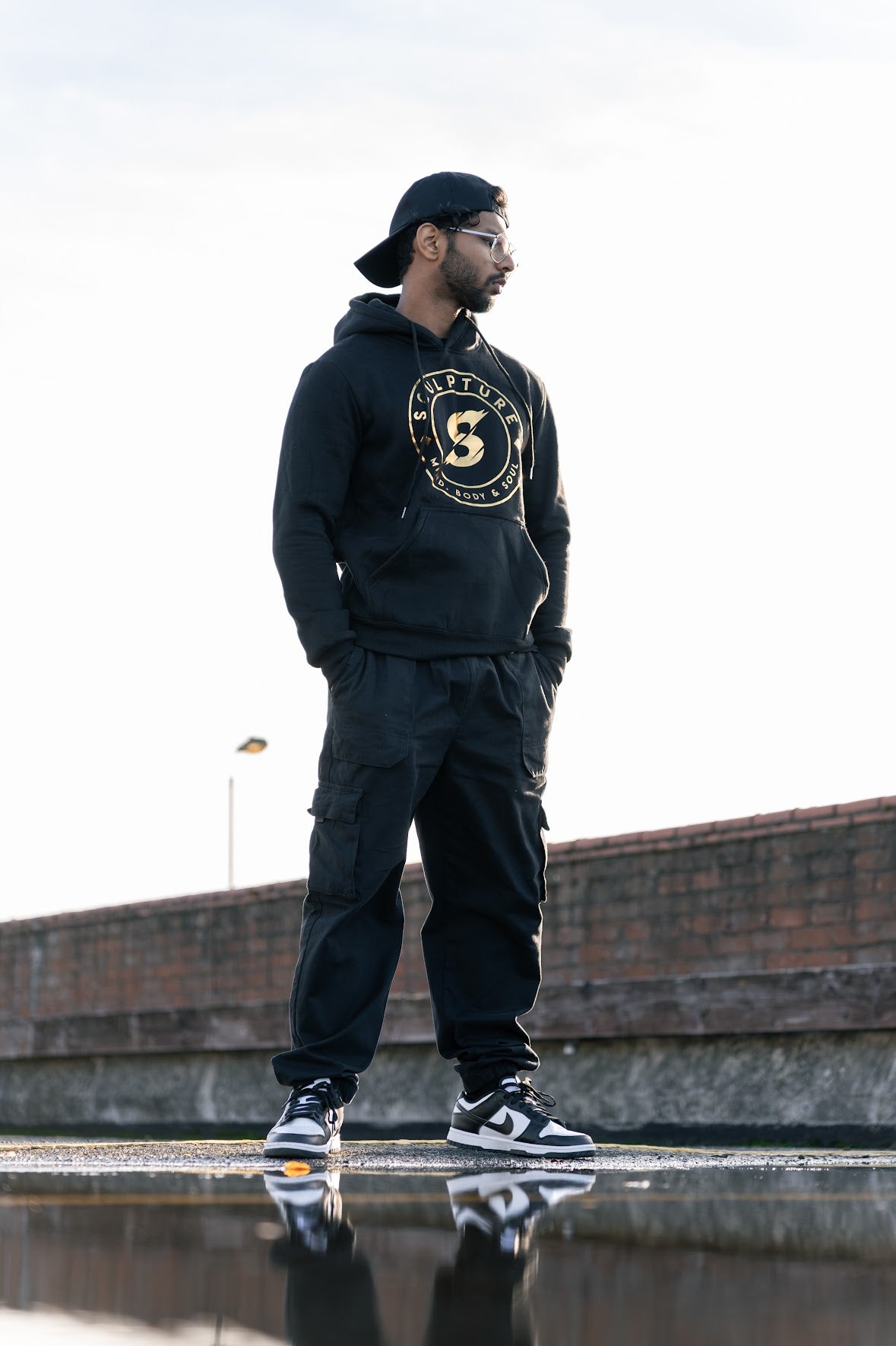 Sculpture Active pullover black and Gold hoodie with kangaroo pocket cotton material