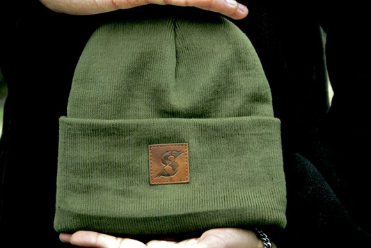 Khaki Green beanie with a brown leather patch with Sculpture Active logo